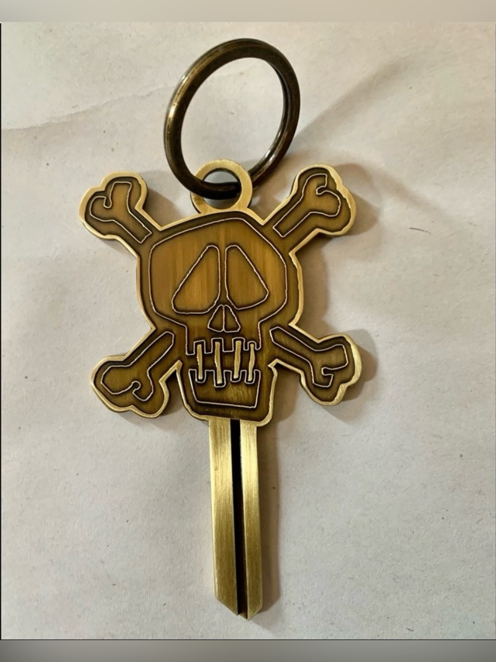 Stussy Vintage Brass Skull & Crossbones Keychain/Key - Deadstock Warehouse Sale.